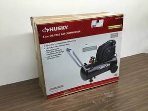 lot 49 image: New in box - Husky 8 Gallon Oil-Free Air Compressor