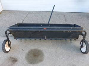 lot 1 image: Lawn Aerator