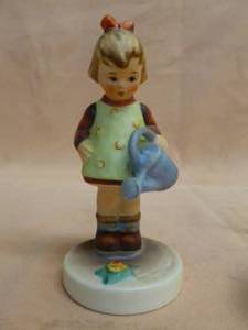 lot 61 image: Hummel Figurine
