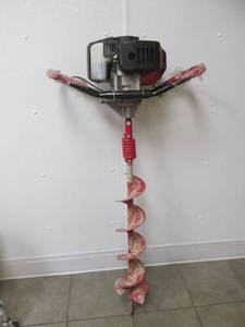 lot 1 image: Earthquake post hole digger