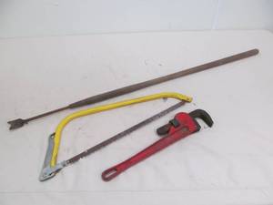 lot 85 image: bow saw, weeder, wrench