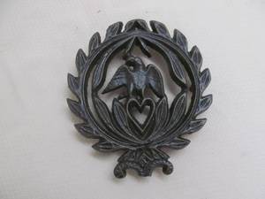 lot 136 image: cast iron trivet