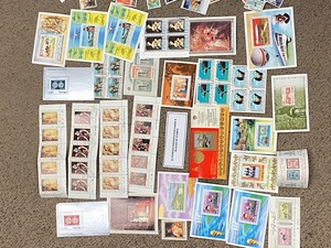 lot 24 image: (25) Foreign Presentation Cards & Over (100) Cancelled Stamps
