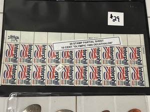 lot 29 image: Lot Of Elongated Pennies  Nickels & 20-Stamp Sheet