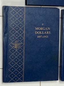 lot 38 image: (3) Morgan Silver Dollars Collection Books