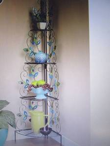 lot 16 image: Peacock Corner Rack open box Retail...