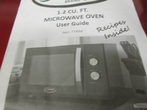 lot 87 image: Ginnys 1.2 cu ft  Microwave open b...
