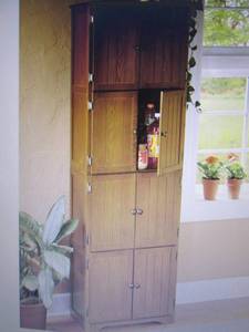 lot 135 image: 8 Door Wall Cabinet open box Retail...