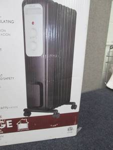 lot 278 image: 1,500-Watt Oil-Filled Radiant Elect...