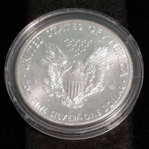 lot 36 image: 2012 AMERICAN SILVER EAGLE 1 TROY OZ. .999 FINE SILVER IN AIRTITE