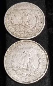 lot 42 image: 2 MORGAN SILVER DOLLARS AS PICTURED