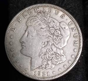 lot 49 image: 2 MORGAN SILVER DOLLARS AS PICTURED