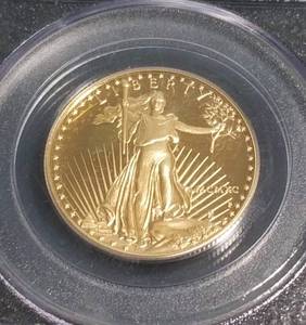 lot 03-A image: 1990-P PROOF US $25 GOLD EAGLE 12 OZ .999 FINE GOLD PR69DCAM