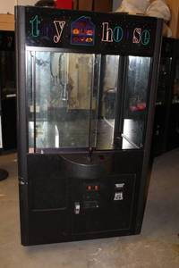lot 142 image: Toy House Rainbow Claw Machine Crane Game