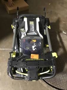 lot 32 image: RYOBI 40V 20 IN. BRUSHLESS SELF-PROPELLED MOWER 2.5 Ah Battery and Charger Included