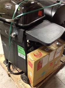 lot 43 image: Pallet whit Dyna-Glo 3-Burner Open Cart Propane Gas Grill in Black, Traeger Eastwood 22 Wood Pellet Grill and Smoker in Silver Vein