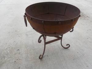 lot 8 image: Heavy 2 piece Metal planter maybe b...