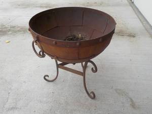 lot 9 image: Heavy 2 piece Metal planter maybe b...