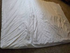 lot 27 image: 56 x 72 Bed Topper with cover...
