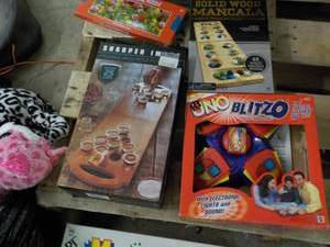 lot 55 image: lot of toys, games, sled and stuffe...