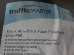 lot 90 image: Traffic Master 36 x 48 Black Foam C...
