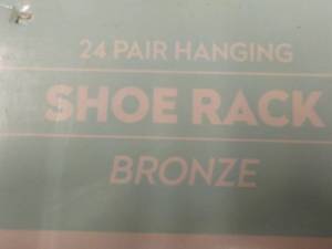 lot 98 image: 24 pair Hanging Bronze Shoe Rack...