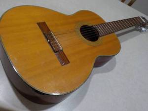 lot 125 image: Ariana Guitar...