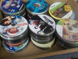 lot 283 image: 300 or so DVDs, Games, CDs, and A...
