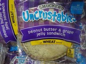 lot 296 image: 2 Containers of Smuckers Uncrustabl...