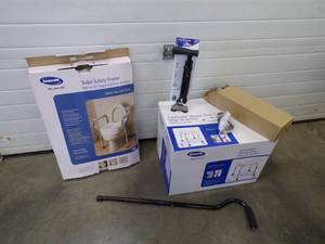 lot 43 image: Hurricane Cane, Black Cane, Toilet Safety Frame, and Bath Stool