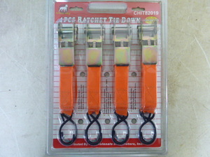 lot 44 image: White Dog 4 Piece Ratchet Tie-Downs