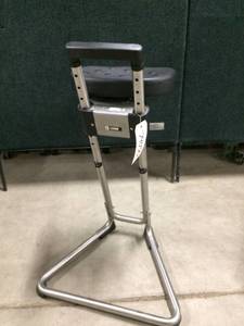 lot 46 image: MSRP $350 Lyons Industrial Sit-Stand Stool helps to take up to 70% of your weight off your legs and feet Great Condition