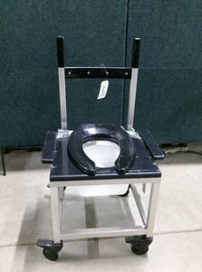 lot 59 image: WOW MSRP $1800 NEW Stainless steel&nbspFrame&nbspBedside Shower Chair Commode With Dropping Arms 1000lb Capacity Wheelchair - Can also be wheeled in over your current toilet for ease of patient transfer and privacy 