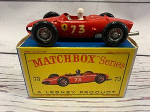lot 48 image: Vintage Lesney Matchbox w Box #73 Ferrari Racing Car w White Driver