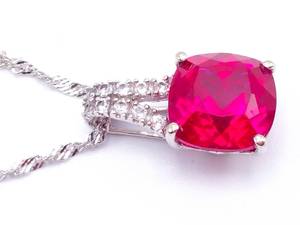 lot 34 image: Red Ruby and Diamond Estate Pendant in 14k White Gold