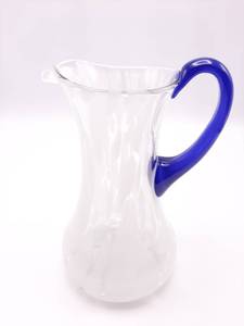 lot 78 image: White and Clear Art Glass Pitcher with Applied Cobalt Glass Handle 8 34 Tall