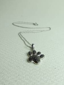 lot 44 image: Sterling Silver Necklace with Pawprint Pendant
