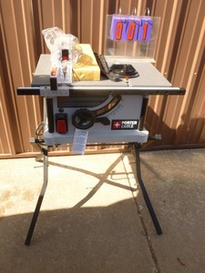 lot 1 image: Porter Cable 10 Table saw. New condition with minor scratches. Tested & works. As shown.