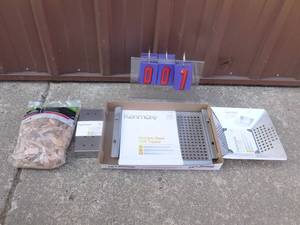 lot 7 image: Flat of grill accessories & wood chips. As shown.