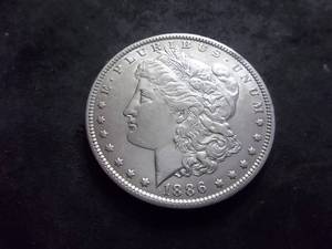 lot 12 image: 1886 O Morgan Silver Dollar