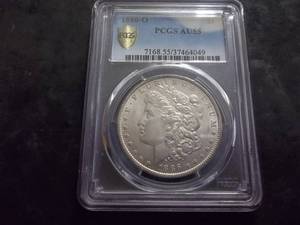 lot 13 image: 1886 O Morgan Silver Dollar