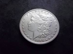 lot 15 image: 1888 O Morgan Silver Dollar