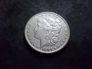 lot 23 image: 1897 S Morgan Silver Dollar