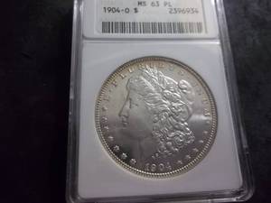 lot 32 image: 1904 O Morgan Silver Dollar