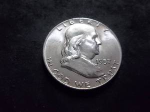 lot 69 image: 1957 D Franklin Half Dollar