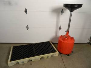 Oil Drain Dolly and Containment Area