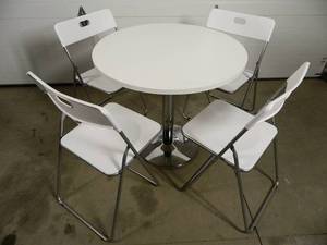 Table with 4 Folding Chairs