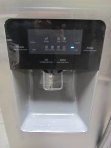 lot 91 image: Samsung 24.52-cu ft Side-by-Side Refrigerator with Ice Maker (Stainless Steel) RS25J500DSR