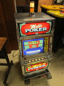 lot 123 image: MULTI POKER MACHINE