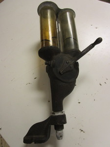 lot 124 image: ANTIQUE DOUBLE RELOADING POWDER MEASURE W CAST IRON BASE